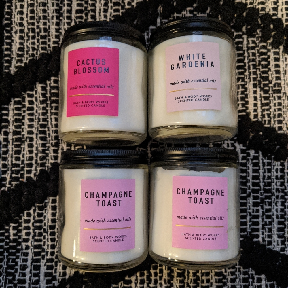 4 Bath & body work candles.